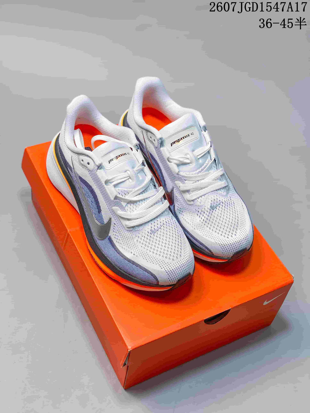 Nike Air Zoom Pegasus 42 Running Shoes in White Blue Orange - product image from the listing.