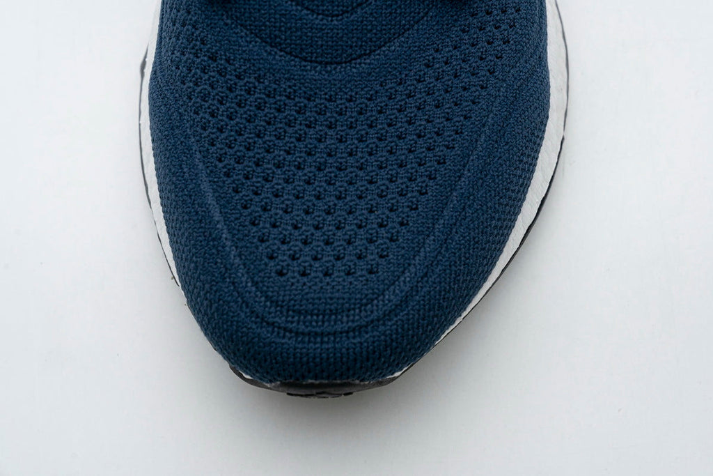 Adidas UltraBoost 21 Running Shoes FY0350 in Navy - product image from the listing.