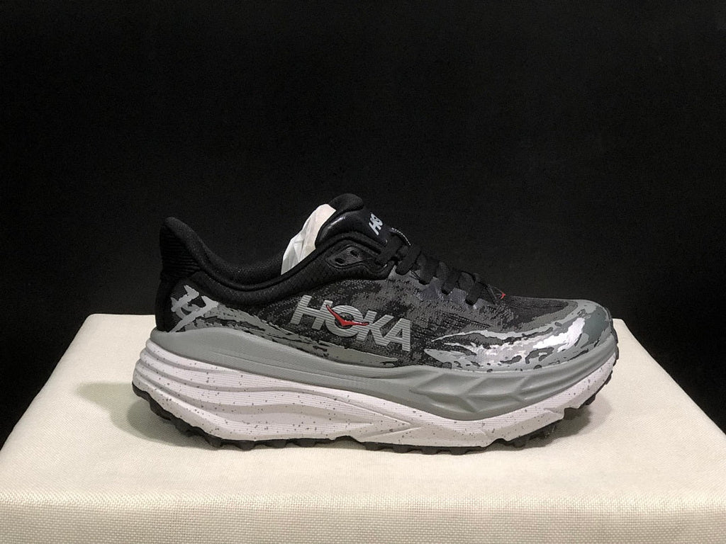 Black and Gray HOKA Stinson 7 Trail Running Shoes - product image from the listing.