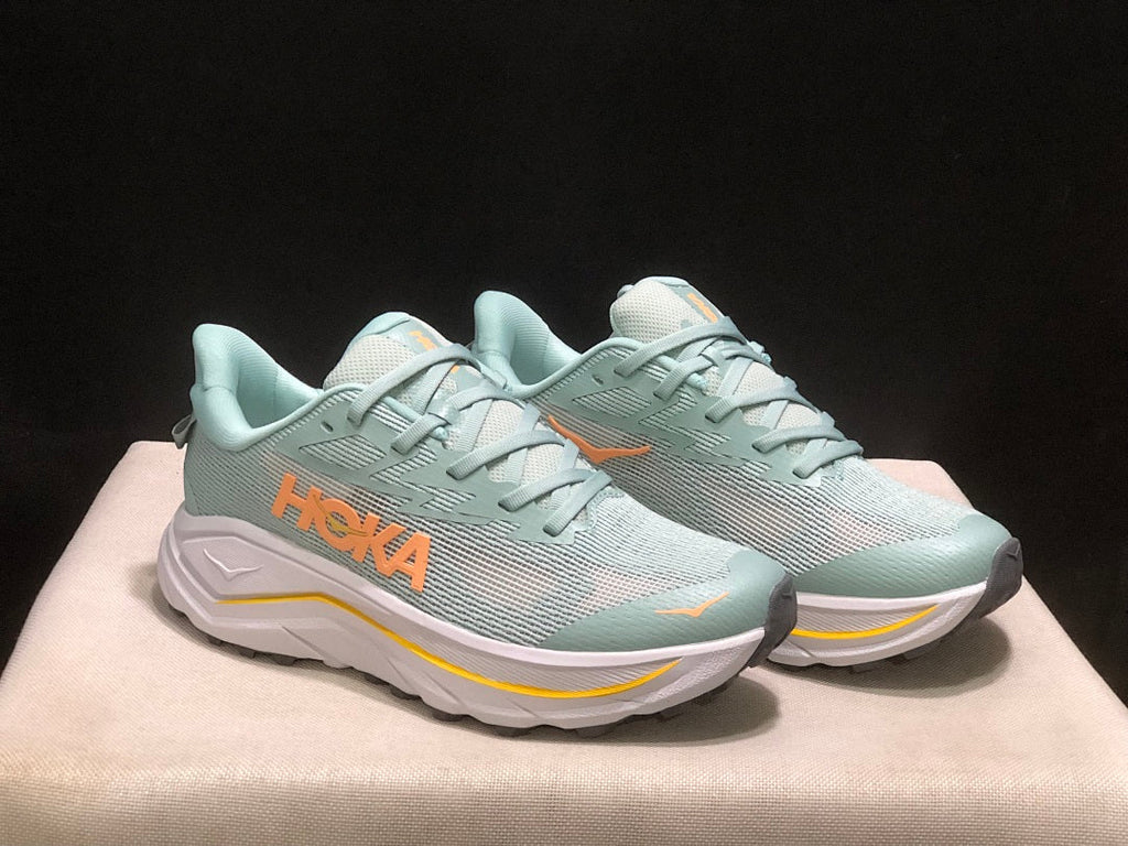 HOKA Challenger 8 Trail Running Shoes, Sage and in Coral - product image from the listing.
