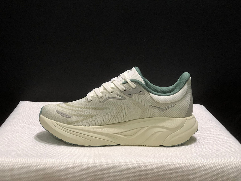 HOKA Arahi 8 Shoes for Running in Cream and Sage - product image from the listing.