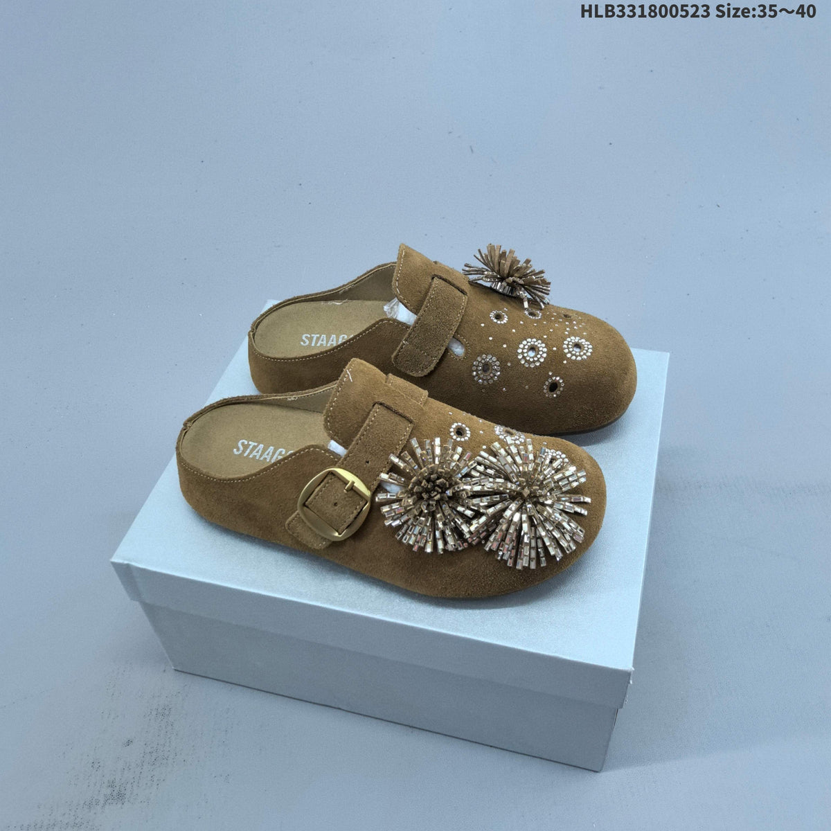 GG-CC Brown Mule Clogs with Firework Embellishment - product image from the listing.