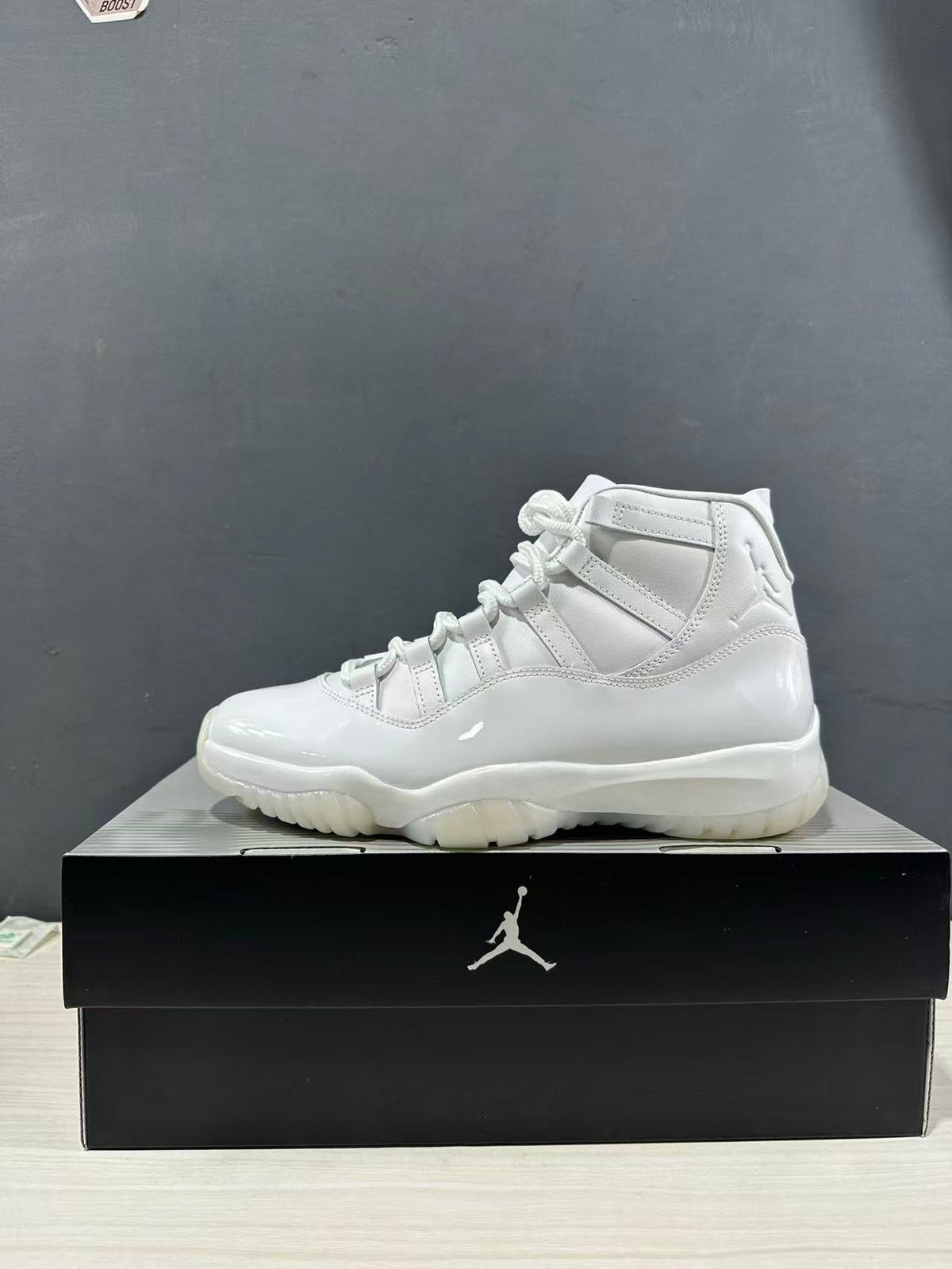 Air Jordan 11 Comme des Garçons White Sneakers IV7639-100 - product image from the listing.