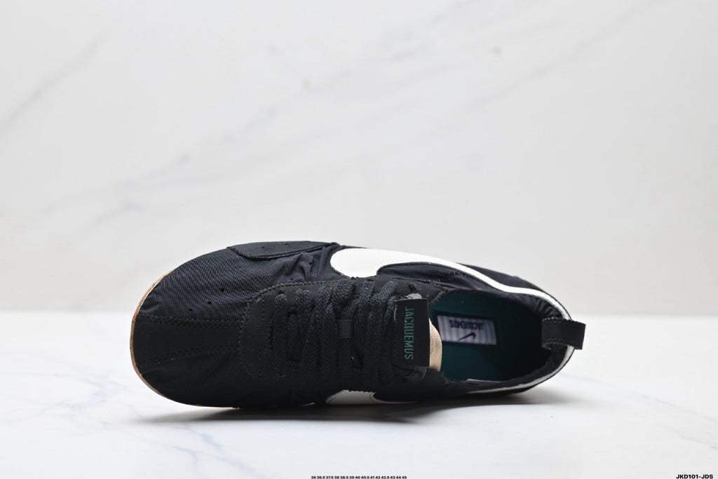 Jacquemus x Nike Jacumoon Sneakers in Black and White - product image from the listing.