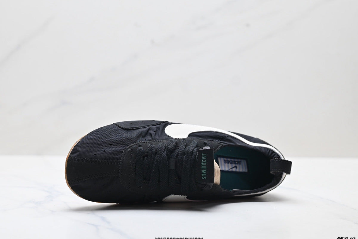 Jacquemus x Nike Jacumoon Sneakers in Black and White - product image from the listing.