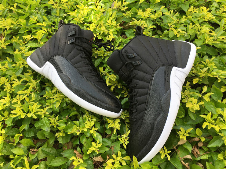 Air Jordan 12 Black Nylon High-Top Sneakers - product image from the listing.