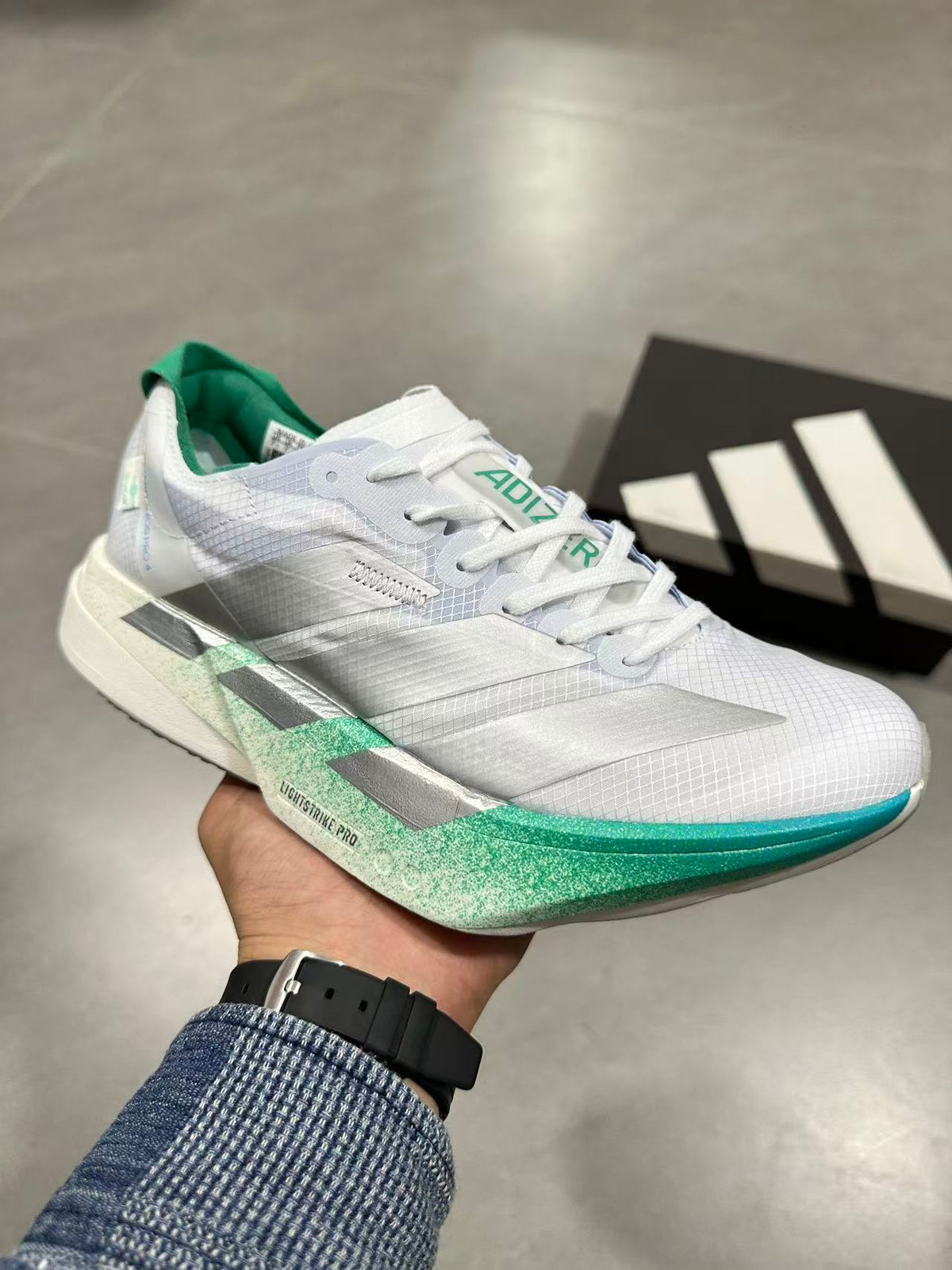 Adidas Adizero Prime X 2 Strung Running Shoes in White Green - product image from the listing.