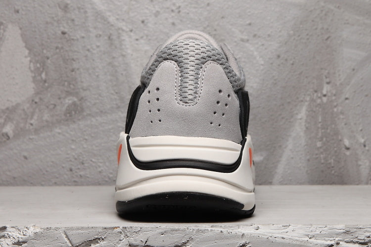 Men's Adidas 700 Sneakers in Gray, Black and Orange - product image from the listing.