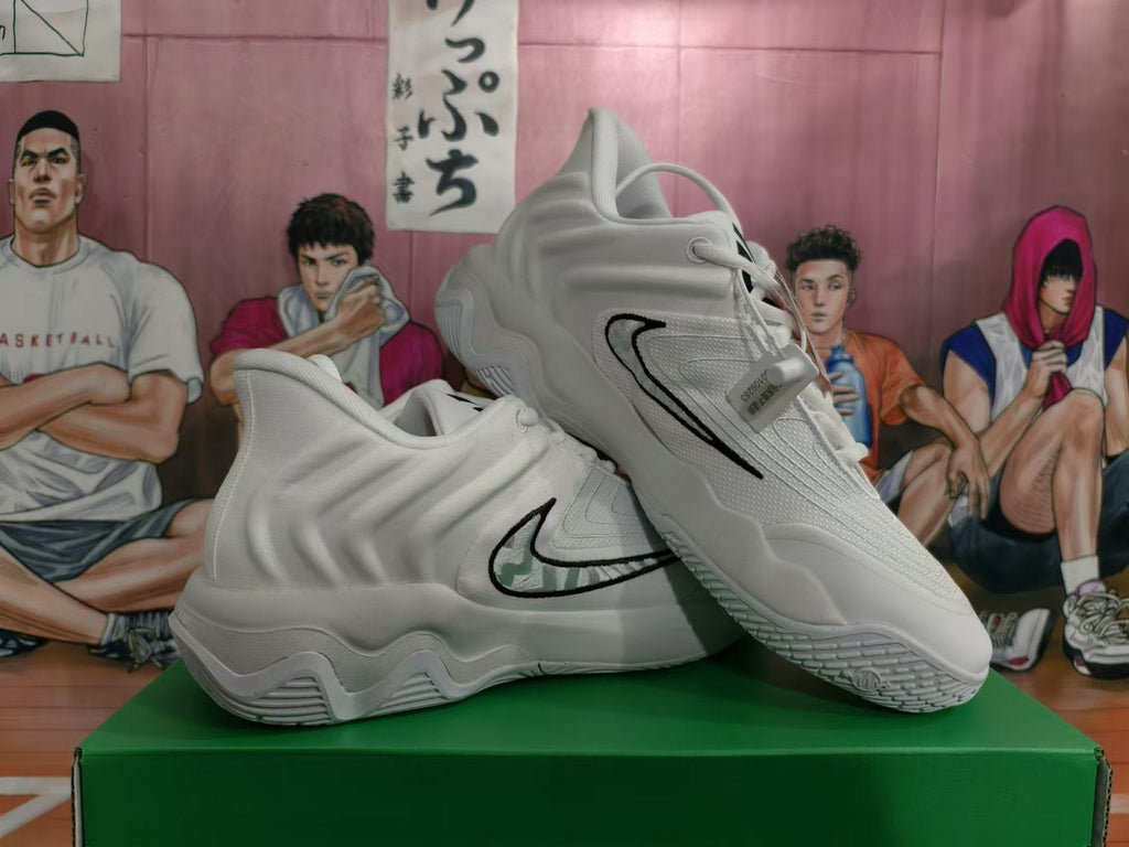 Nike White Basketball Trainers with Black Swoosh - product image from the listing.
