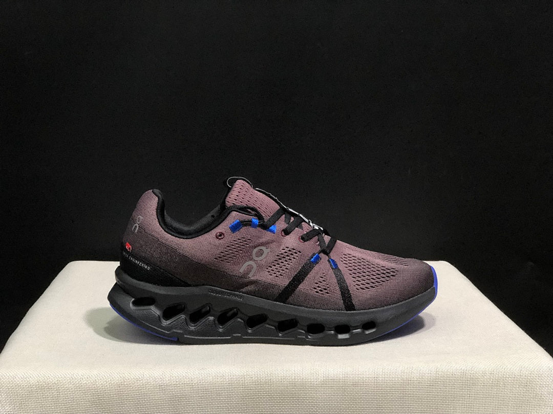 Charcoal and Blue On Cloudsurfer Running Shoes - product image from the listing.