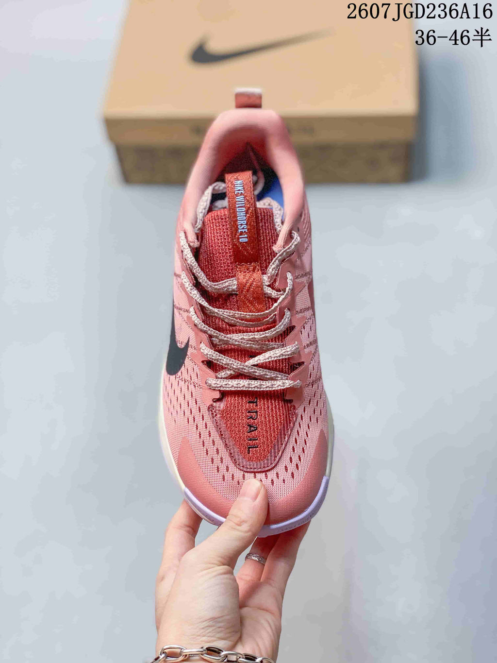 Nike ReactX Wildhorse 10 Trail Shoes in Pink - product image from the listing.