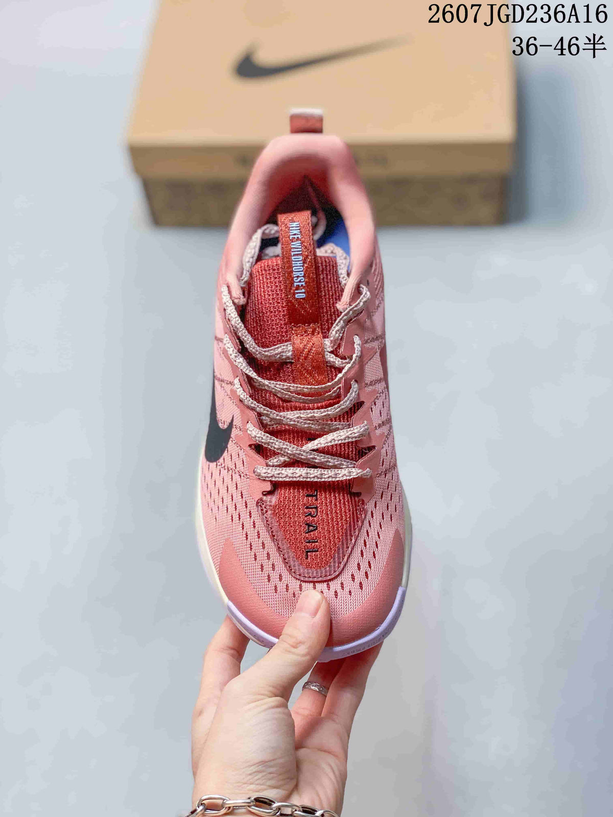 Nike ReactX Wildhorse 10 Trail Shoes in Pink - product image from the listing.