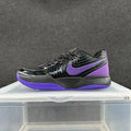 Nike Sneakers in Black and Purple - product image from the listing.