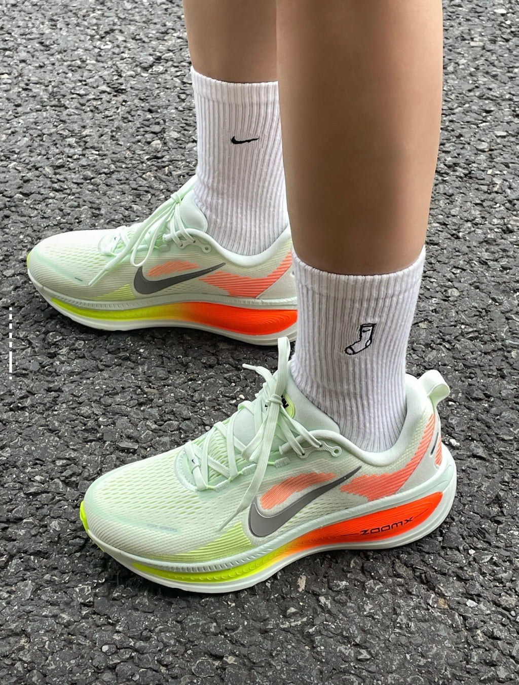 Nike Vomero 18 Running Shoes in Green Orange HM6803-300 - product image from the listing.