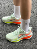 Nike Vomero 18 Running Shoes in Green Orange HM6803-300 - product image from the listing.