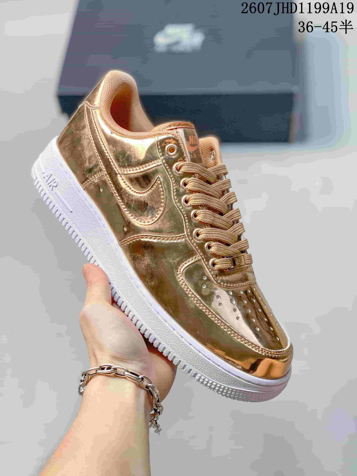 Nike Air Force 1 '07 Low Sneakers in Metallic Gold - product image from the listing.