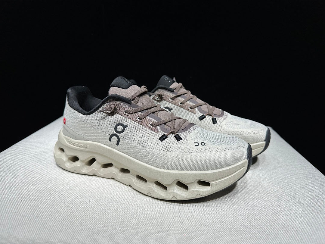 On Cloudtilt Sneakers, in Light Gray and Black - product image from the listing.