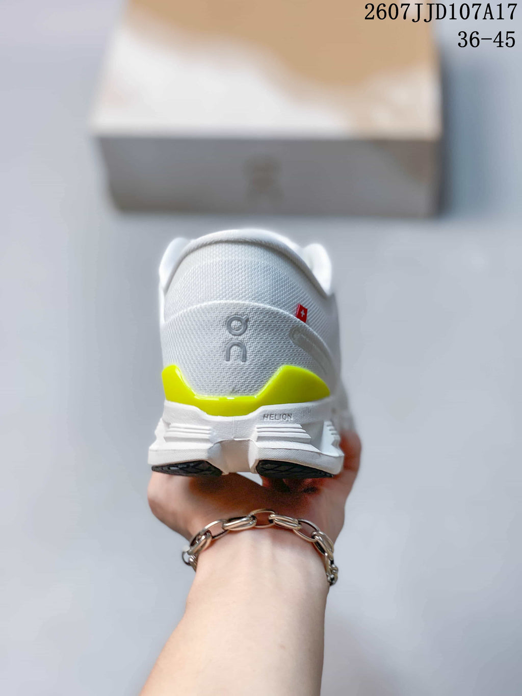 On Running Cloud X 4 AD Sneakers in White Lime 2607JJD107A17 - product image from the listing.