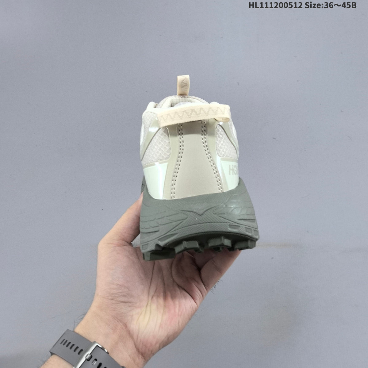 HOKA Mafate Three 2 Trail Running Shoes in Cream and Gray - product image from the listing.