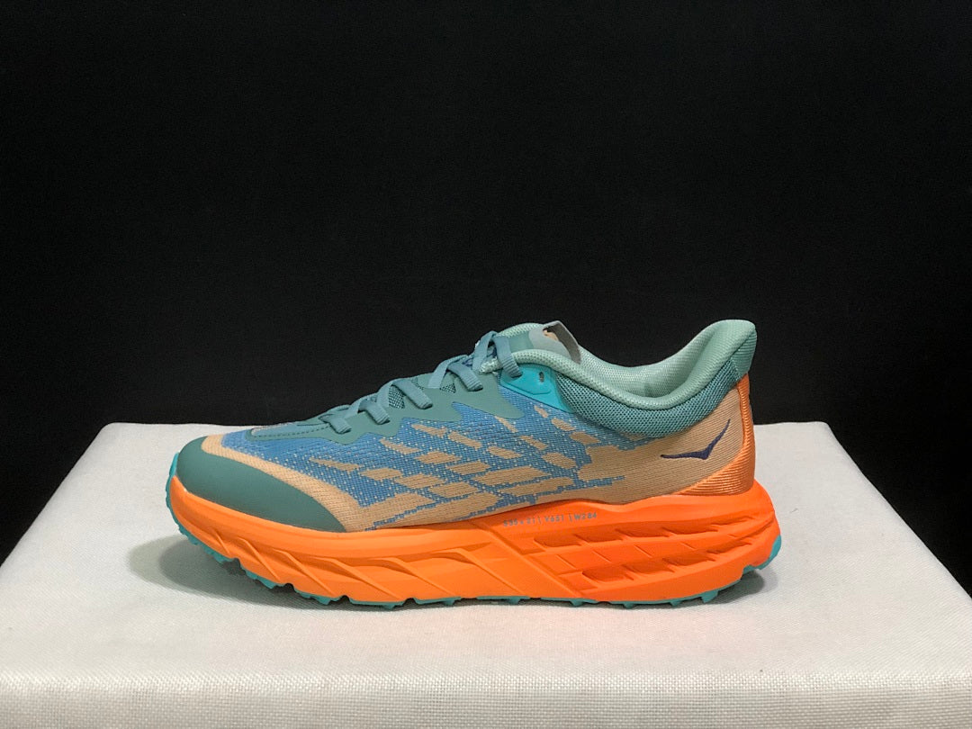 HOKA Speedgoat 5 Trail Running Shoes in Blue Orange - product image from the listing.