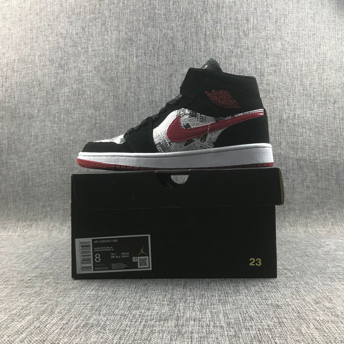 Air Jordan 1 Mid Sneakers in Black Red 852542-061 - product image from the listing.