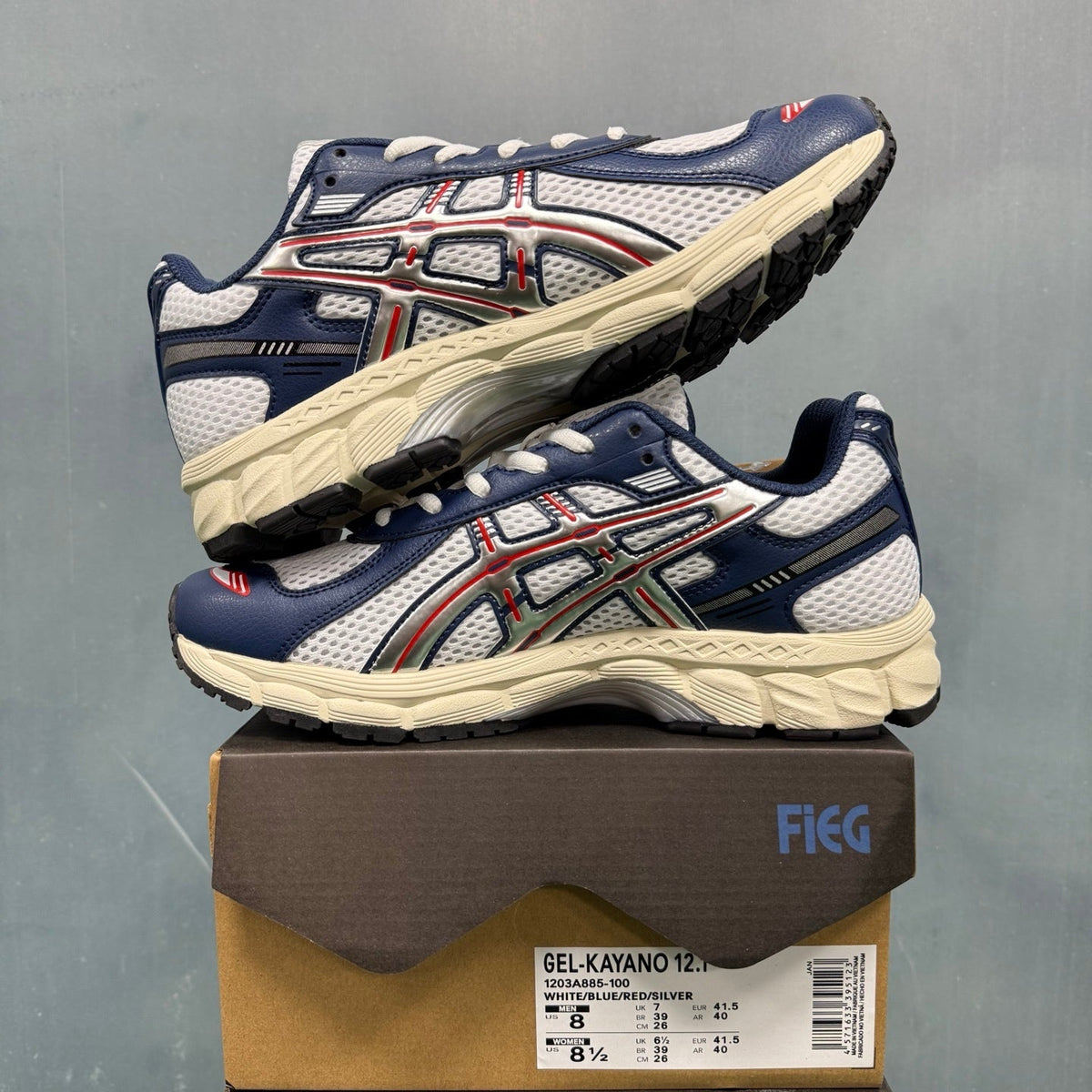 ASICS GEL-KAYANO 12.1 Sneakers in White Blue Red 1203A885-100 - product image from the listing.