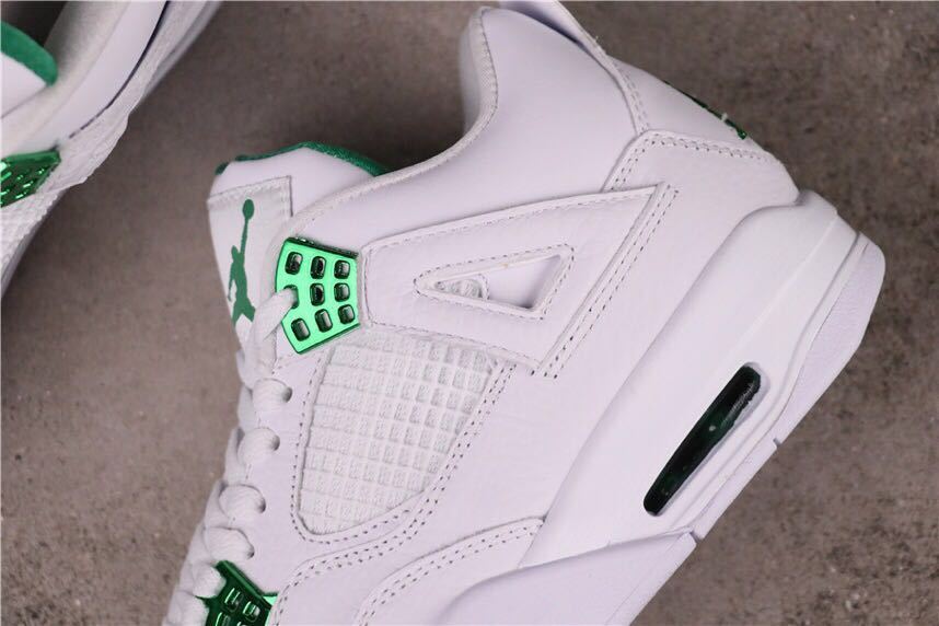 Pine Green Sneakers White/Green - Nike Air Jordan 4 CT8527-113 - product image from the listing.