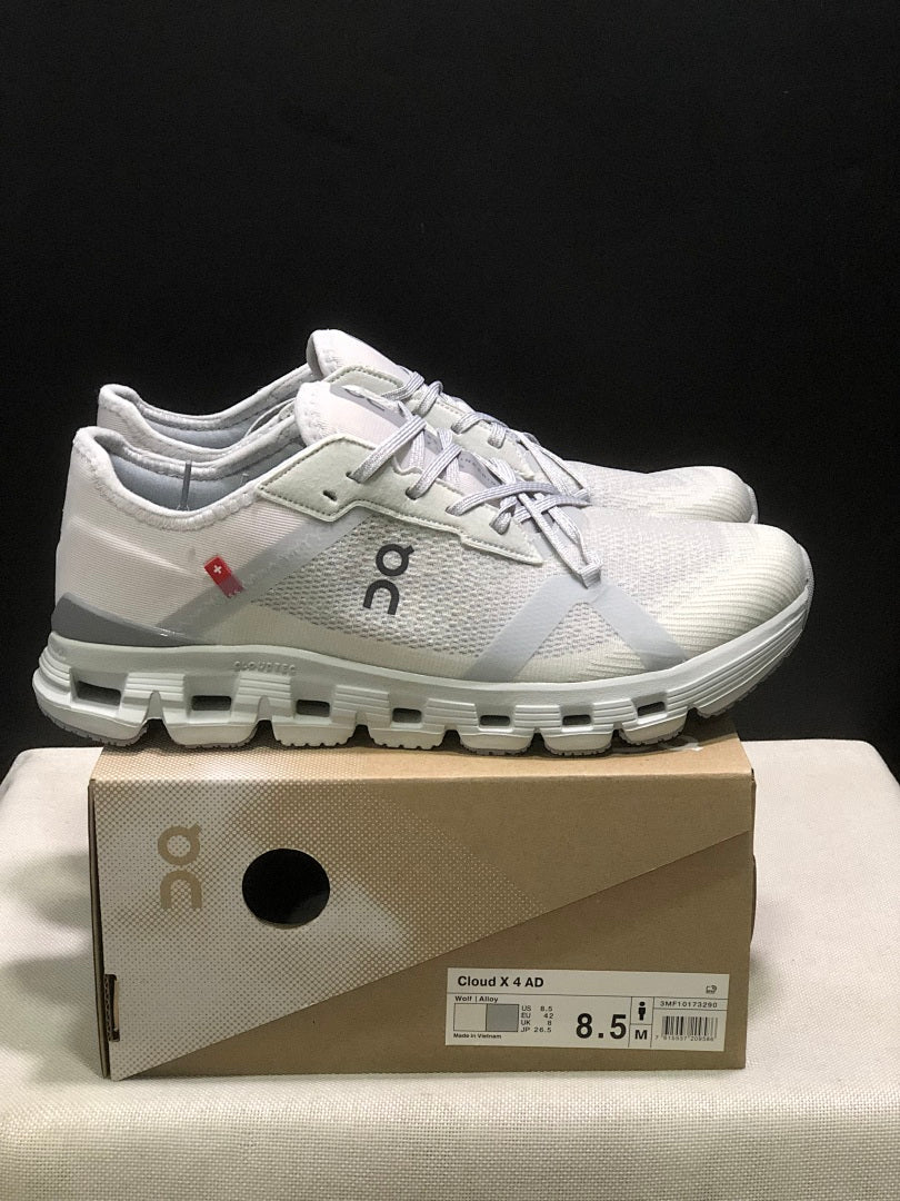 On Cloud X 4 AD Sneakers in Wolf/Alloy in Light Gray - product image from the listing.