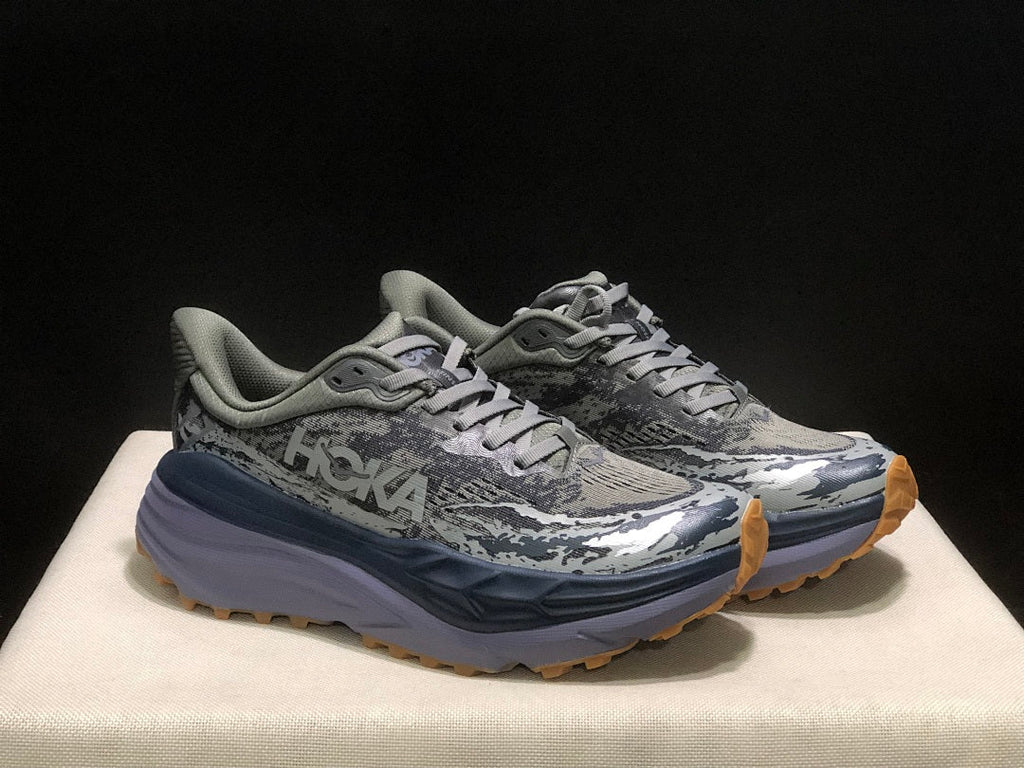 Gray HOKA Stinson 7 Trail Running Shoes - product image from the listing.