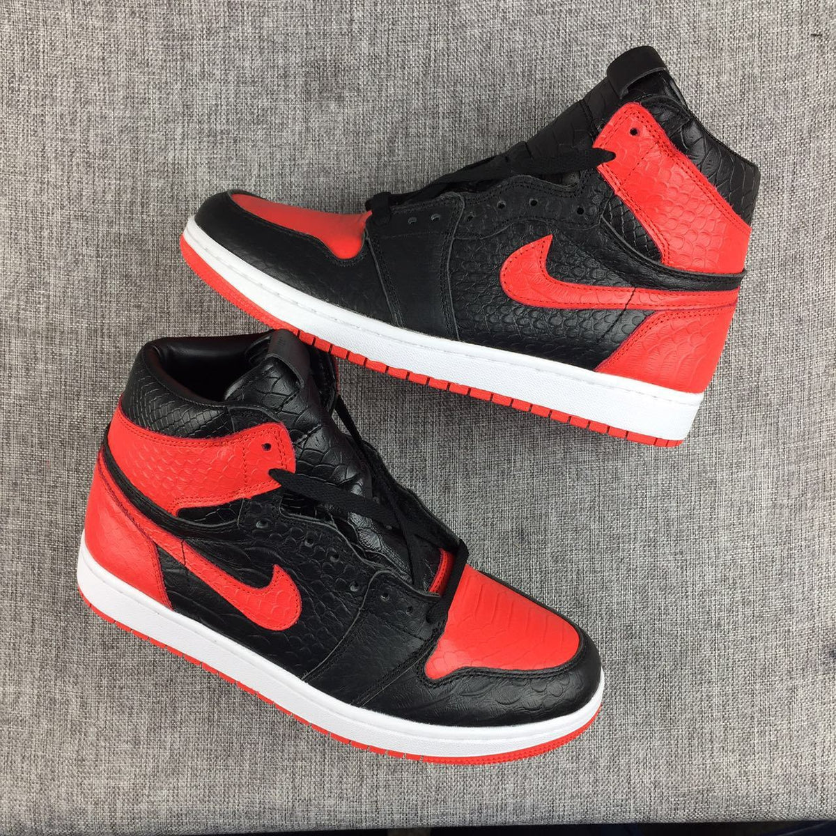 Black Red Scale-Textured Sneakers - Air Jordan 1 High - product image from the listing.