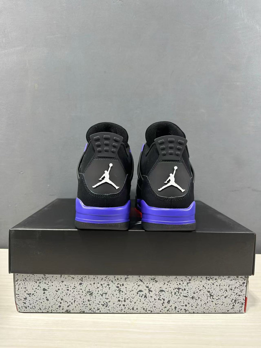 Air Jordan 4 Retro Black Blue Sneakers CT8527-018 - product image from the listing.