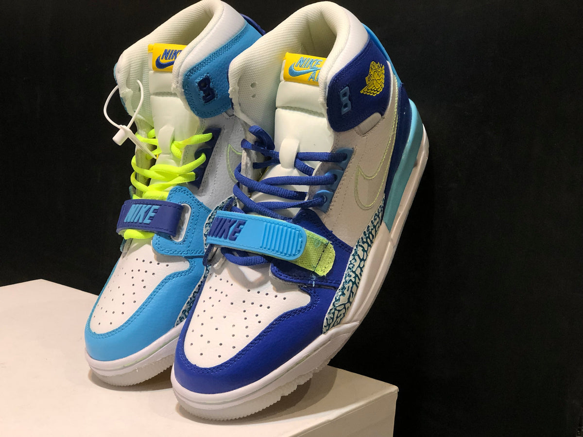 Air Jordan Legacy 312 Fly High-Top Sneakers, in White and Blue - product image from the listing.