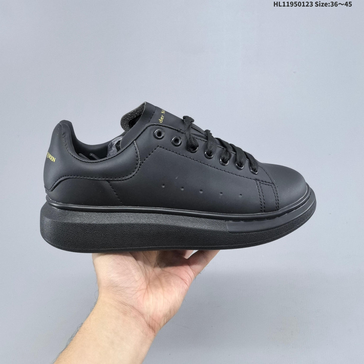 Alexander McQueen Oversized Low-Top Sneakers in Black HL11950123 - product image from the listing.