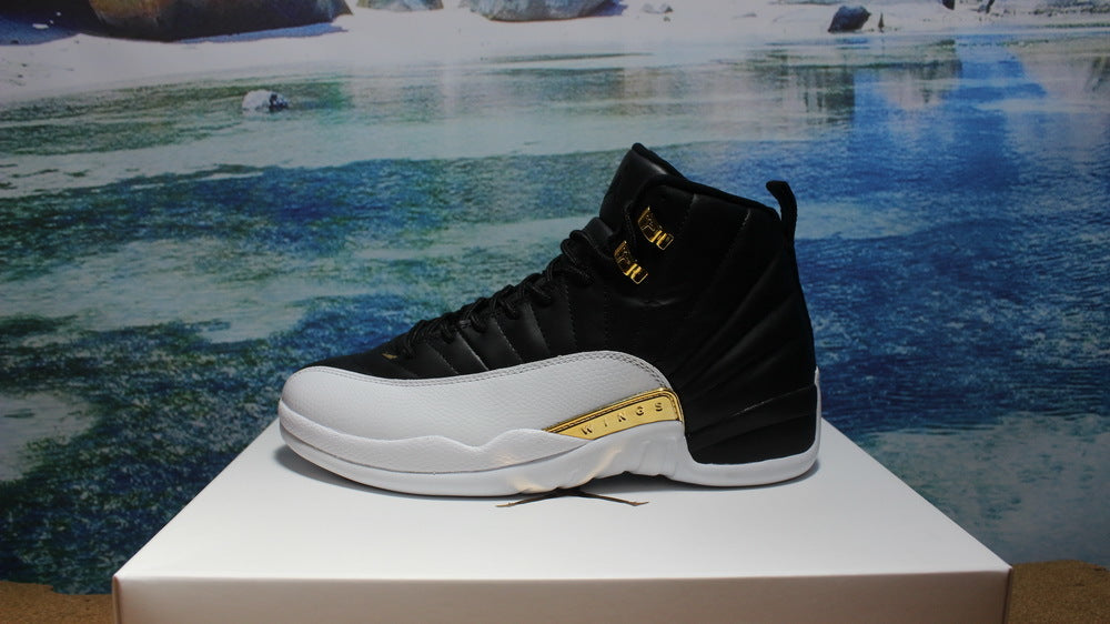 Air Jordan 12 Wings Black White Gold Sneakers 848692-033 - product image from the listing.