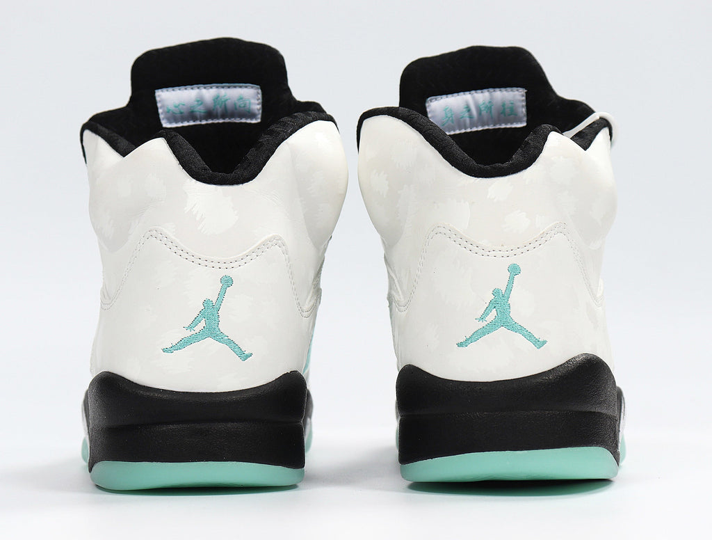 Jordan 4 Retro Sneakers in White and Mint CN2932-100 - product image from the listing.