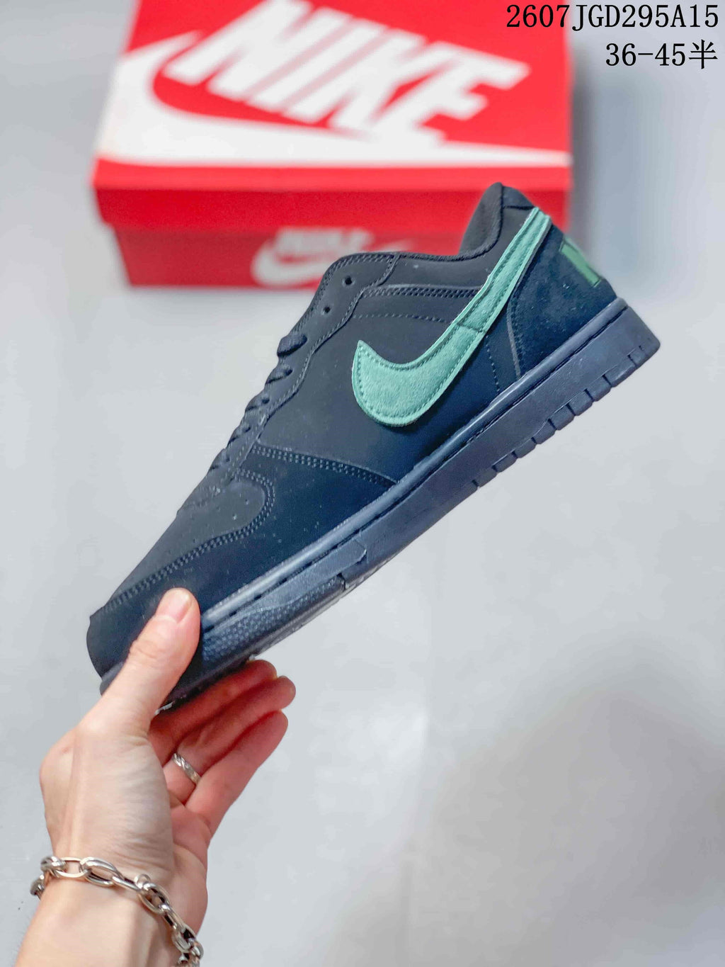 Nike SB Dunk Low Pro Sneakers in Black Mint 2607TGD295A15 - product image from the listing.