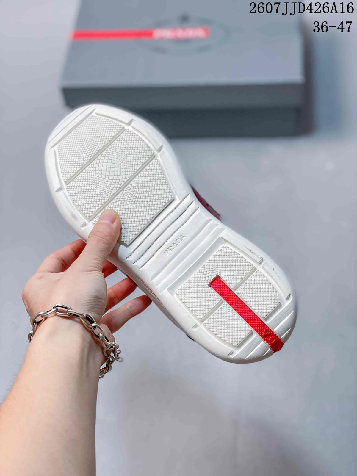 Prada 2607JJD426A16 Red and White Platform Trainers - product image from the listing.