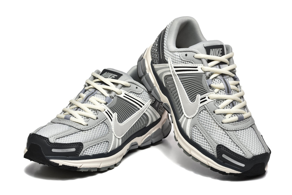 Grey and White Nike Zoom Vomero 5 Sneakers - product image from the listing.