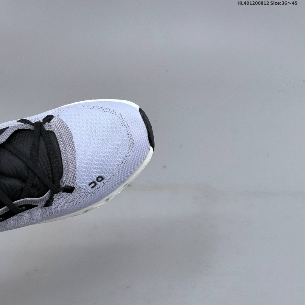 White and Black On Cloudtilt Sneakers - product image from the listing.