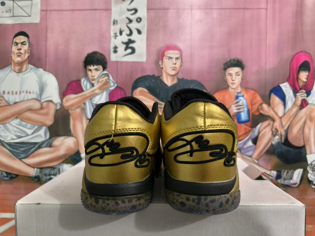 Metallic Gold and Black Nike Basketball Shoes - product image from the listing.