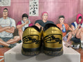 Metallic Gold and Black Nike Basketball Shoes - product image from the listing.