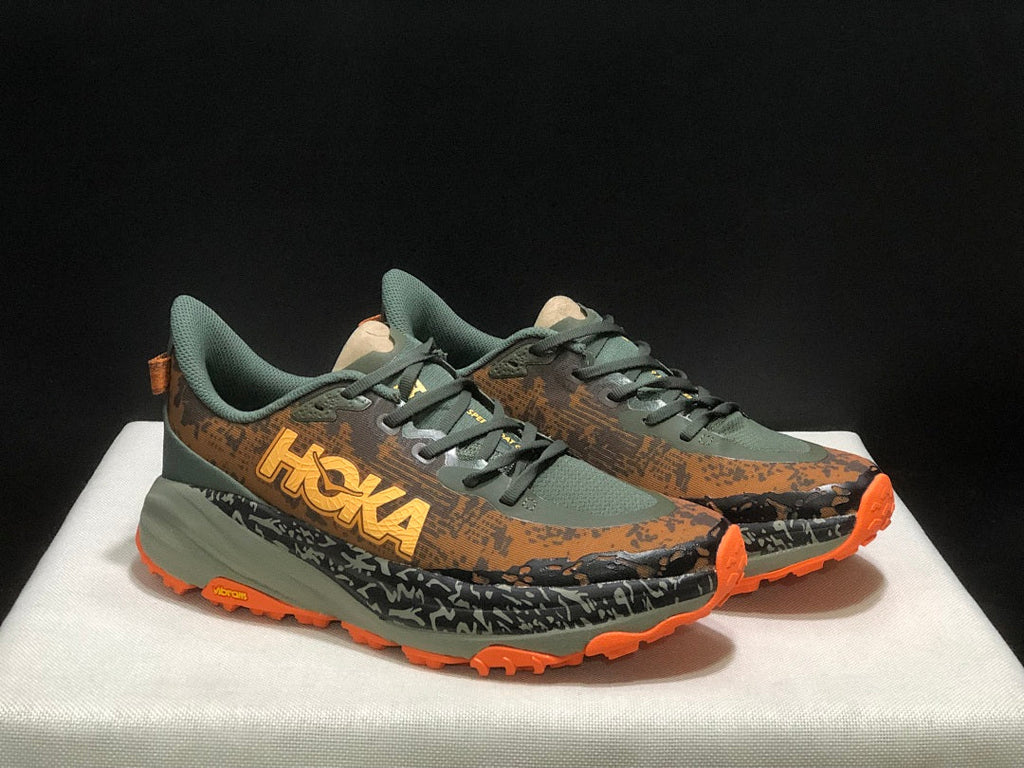 Olive and Orange HOKA Speedgoat 6 Trail Running Shoes - product image from the listing.