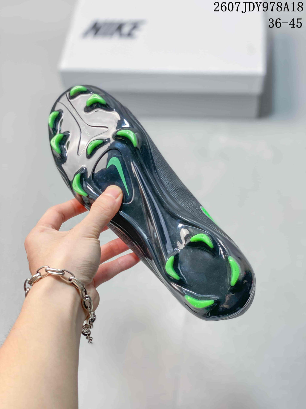 Nike Mercurial Vapor 16 Elite AG-PRO Soccer Cleats in Black Green - product image from the listing.