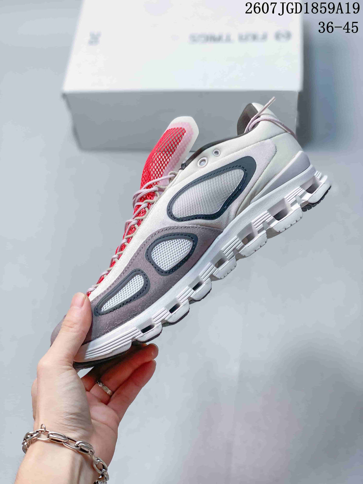 On Cloud X FKA twigs Sneakers in White Gray Red 2607JGD1859A19 - product image from the listing.