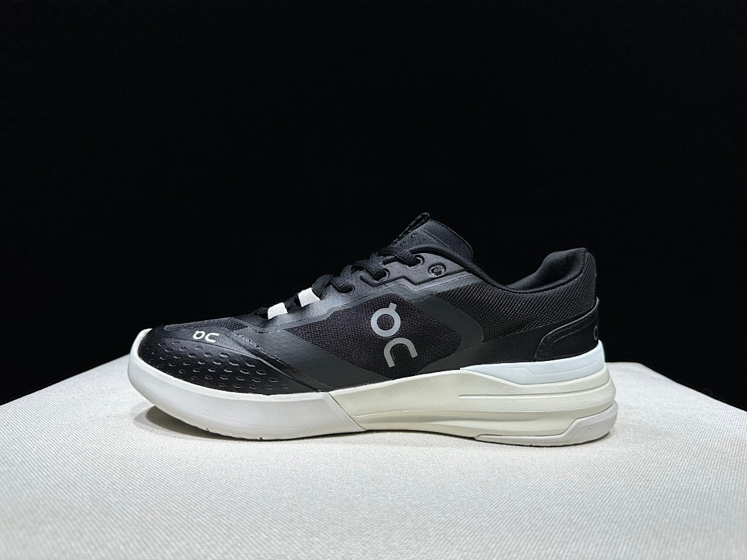 On THE ROGER Clubhouse Pro Tennis Sneakers in Black and White - product image from the listing.