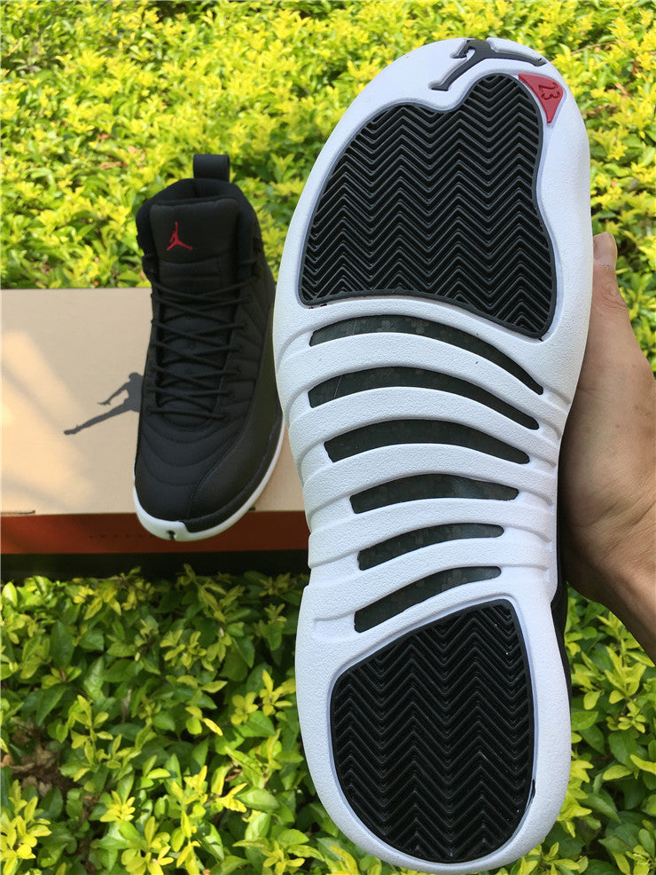 Air Jordan 12 Black Nylon High-Top Sneakers - product image from the listing.