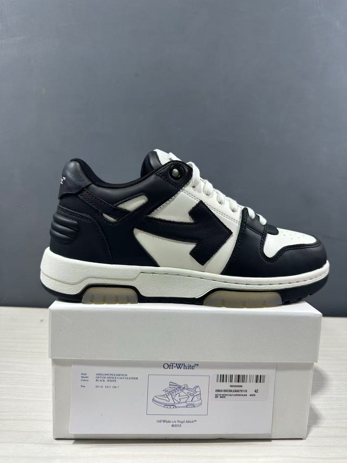 Off-White Out Of Office Low-Top Sneakers in Black White OMAI89C99LEA0070110 - product image from the listing.