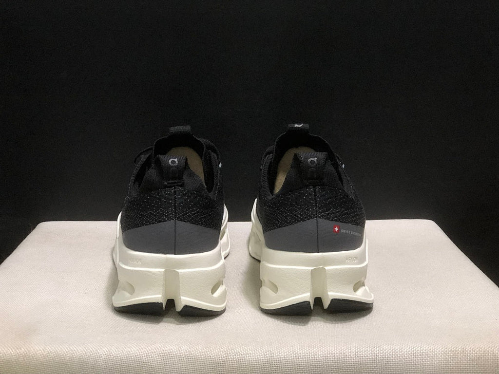 On Cloudsurfer Max Running Sneakers in Black and White - product image from the listing.