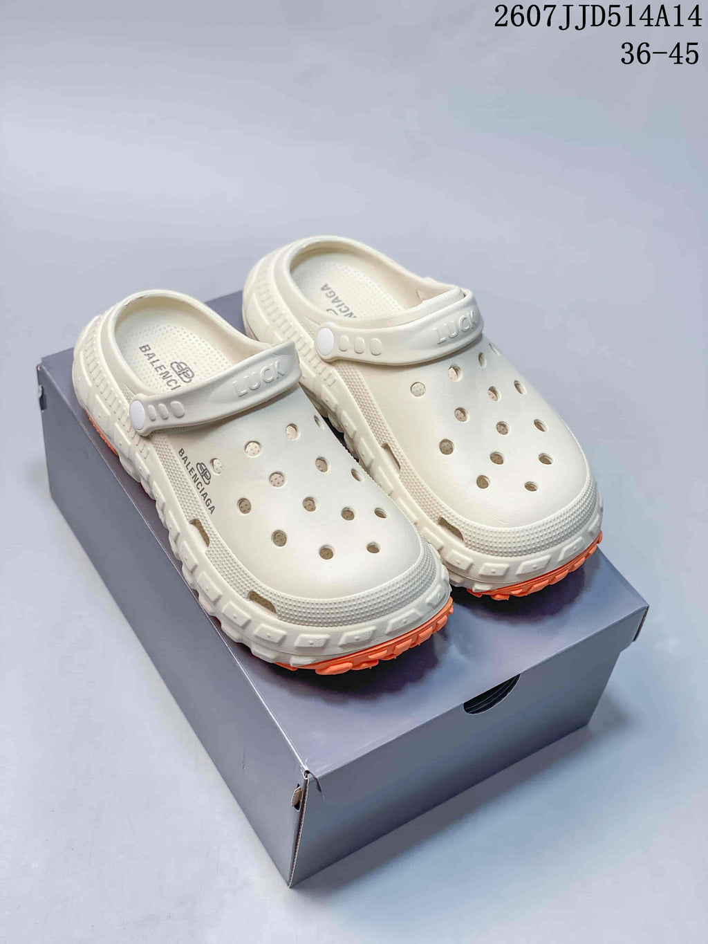 Balenciaga Tire Clog Sandals Off-White in Orange 2607JJD514A14 - product image from the listing.