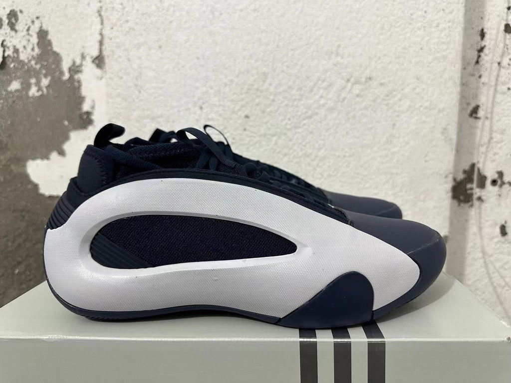 Navy and White Adidas Basketball Shoes - product image from the listing.